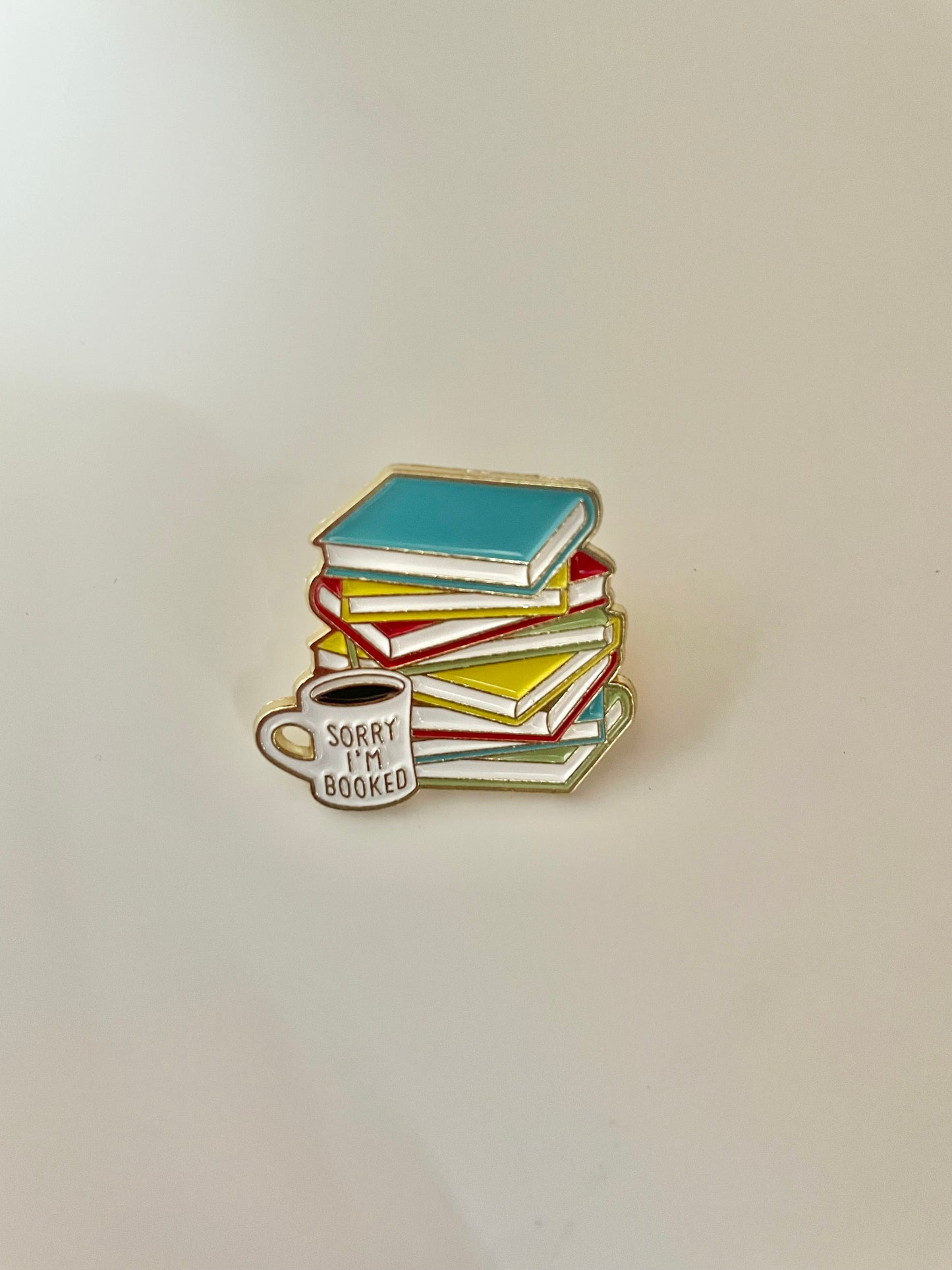 I’m booked enamel pin