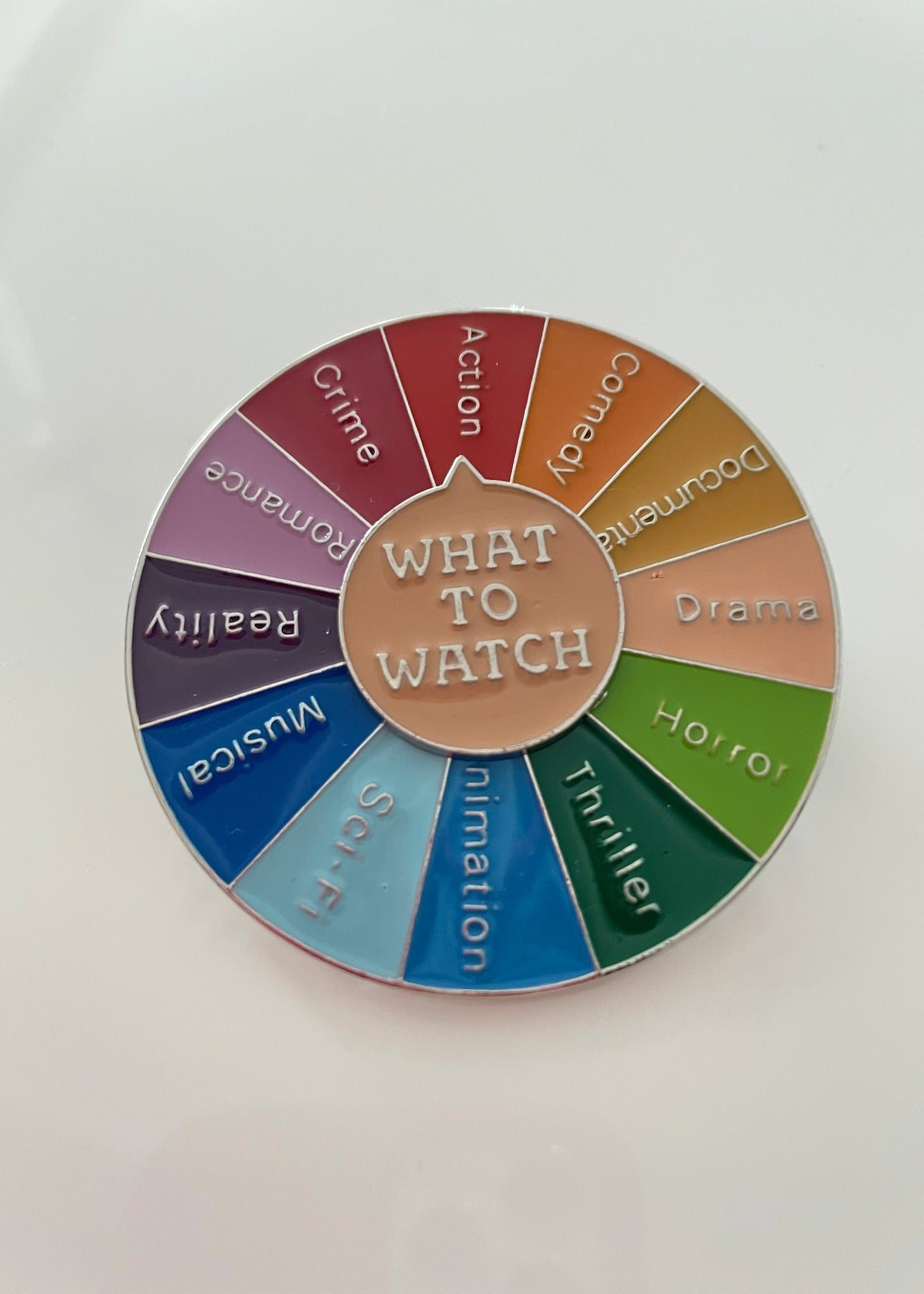 What to watch spinner enamel pin
